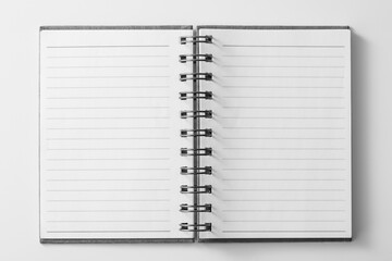 Open spiral notebook with blank pages for notes and ideas