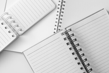 Blank Notebooks with Spiral Binding on White Background