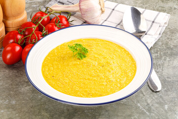 Vegetarian corn cream soup served parsley
