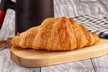 Fresh hot homemade croissant for breakfast