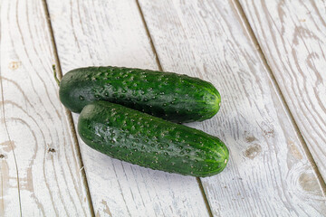 Ripe green raw two cucumbers