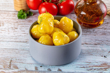 Boiled young potato with oil