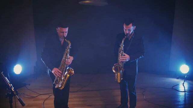 Saxophone performance showcases talented musicians in an intimate setting with atmospheric lighting and sound