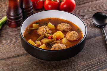 Tomato Soup with meatballs and vegetables