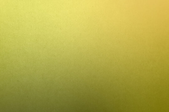 Bright olive green tone color paint on blank eco environmental friendly cardboard box paper texture background with space minimal simple style