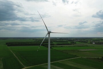 Skyline with modern turbine and dark clouds