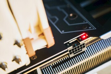 Angled 12VHPWR power connector plugged into GPU