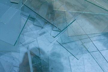 Sharp, dangerous sheet glass wastes waiting the transport back to the factory for recycle.