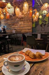 Breakfast: cappuccino coffee and pain au Chocolat 