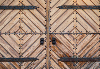 Detail of wooden barn door .