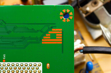 Printed circuit boards with electronic components close-up, photo for a project about the...