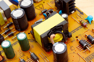 Printed circuit boards with electronic components close-up, photo for a project about the...