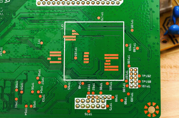 Printed circuit boards with electronic components close-up, photo for a project about the...