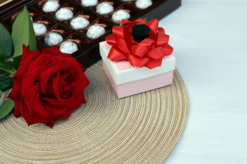 A beautiful rose, a small gift, a heart and a box of chocolates will make us happy any day