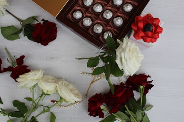 A beautiful rose, a small gift, a heart and a box of chocolates will make us happy any day
