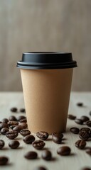 A disposable coffee cup, light beige/tan color, with a black lid, sits on a light wooden surface, surrounded by scattered coffee beans