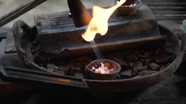 Silver metal melting high temperature fire handcrafted jewelry making art craft