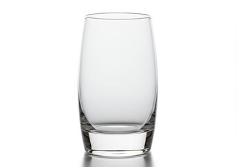 Elegant empty glass tumbler on a white surface ready for beverage service