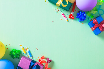 Birthday party background with a corner border of colorful gifts, balloons, and confetti.