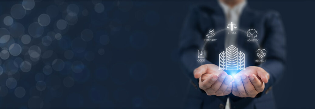Code of conduct in business concept. Holding a glowing holographic corporate, surrounded by icons; code, integrity, honesty, respect, and ethics,  the foundation of a strong corporate code of conduct.