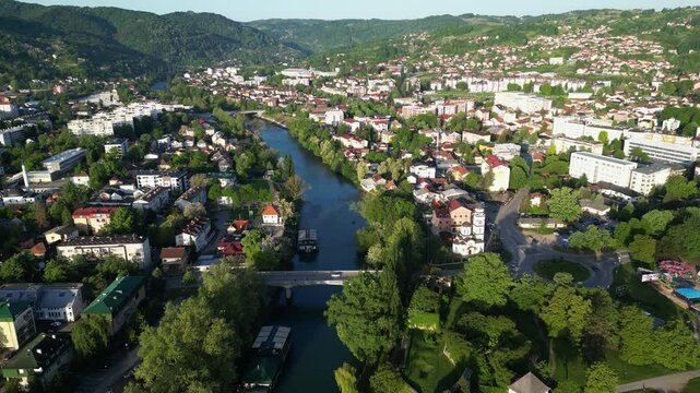 Aerial footage of river Vrbas, flowing through the city of Banja Luka, Bosnia and Herzegovina. Flying Forwards.