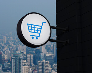 Shop cart icon on hanging black rounded signboard over modern city tower, office building and skyscraper, Business shopping online concept, 3D rendering