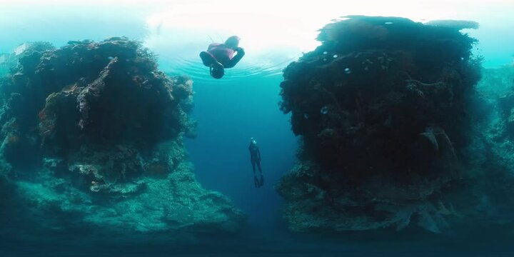 VR 360 Underwater panorama of the freediver swimming in the sea on a breath hold