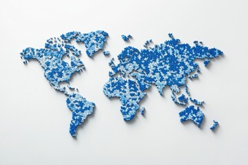 Blue puzzle pieces assembled into a world map on white background