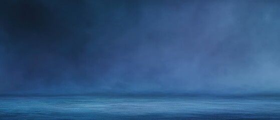 The tranquil blue seascape with atmospheric fog and serene reflections.