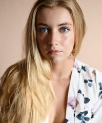 Portrait of beautiful sensual woman with blue eyes. Studio shot.