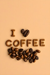 on a beige background the inscription I love coffee made from cookies and coffee beans

