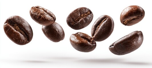 Obraz premium The floating coffee beans captured in a fresh, aromatic moment.