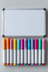 White blank notice board and markers of different colors

