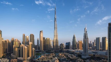 Dubai timelapse, sunrise over skyscrapers in Downtown Dubai, United Arab Emirates (UAE), modern buildings and cityscapes, innovation, business and finance concept, zooming in.	
 - Powered by Adobe