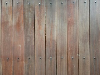 Fence arrangement made of wood wall background texture