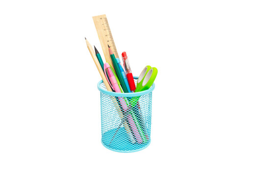 School and office supplies, pens, pencils, ruler, compass in a metal cup on a white background. - Powered by Adobe