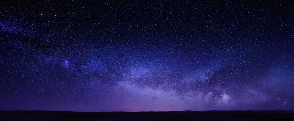 The breathtaking view of a starry night sky filled with galaxies and cosmic beauty.