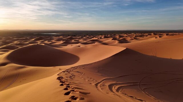 Merzouga, Morocco: Panoramic view of the sunset over the Merzouga from the Erg Chebbi sand dunes in the the Sahara desert in Morocco