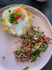 Rice topped with stir-fried pork and basil, Rice topped with stir fried minced pork and basil with Fried egg