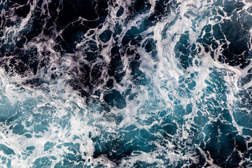 Ocean water texture. Top view of classy water with foam. Can be used in covers, packaging, posters,...