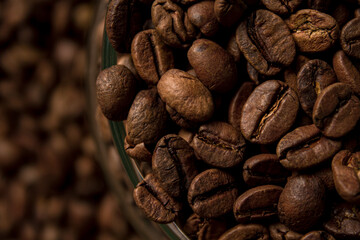 Coffee beans close-up full screen. Freshly roasted coffee beans
