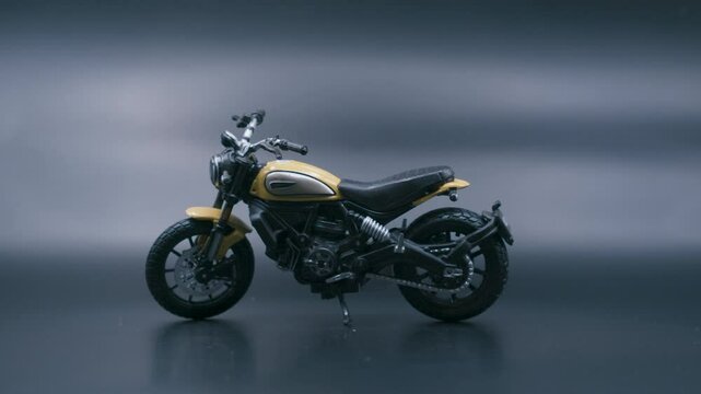 Ducati Scrambler 1:18 Diecast Model on Dark Background - Angle 4