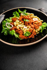 Bean salad tuna canned fish fresh delicious gourmet food background on the table rustic food top view copy space keto and paleo diet vegetarian food pescetarian diet