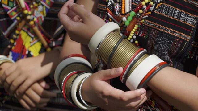 traditional Rung people attire and accessories close-up of hands