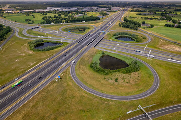 Dutch landscape with roundabout Voorst intersection transit aerial near Apeldoorn in....