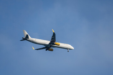 plane flying over Port of Barcelona, ​​Catalonia, Spain