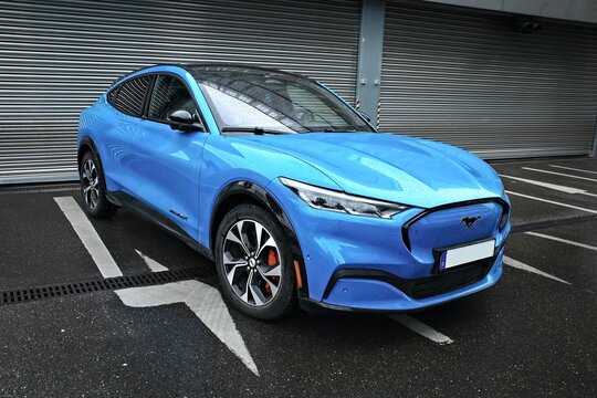 Neu-Ulm, Germany - June, 19, 2025:  Ford Mustang Mach E, electric compact crossover SUV parking.