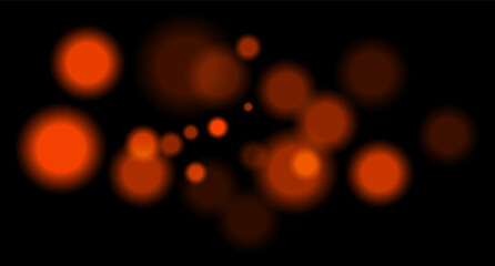 Orange blurred bokeh circles on black background with soft glow, imitating distant lights or defocused highlights in low-light environment.