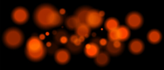 Orange blurred bokeh particles with varying size and opacity on black background. Abstract design element for festive or sci-fi scenes.
