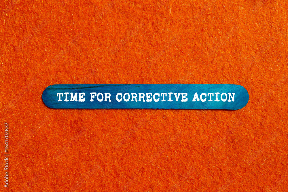 Poster time for corrective action message written on blue wooden stick on orange background. conceptual tim